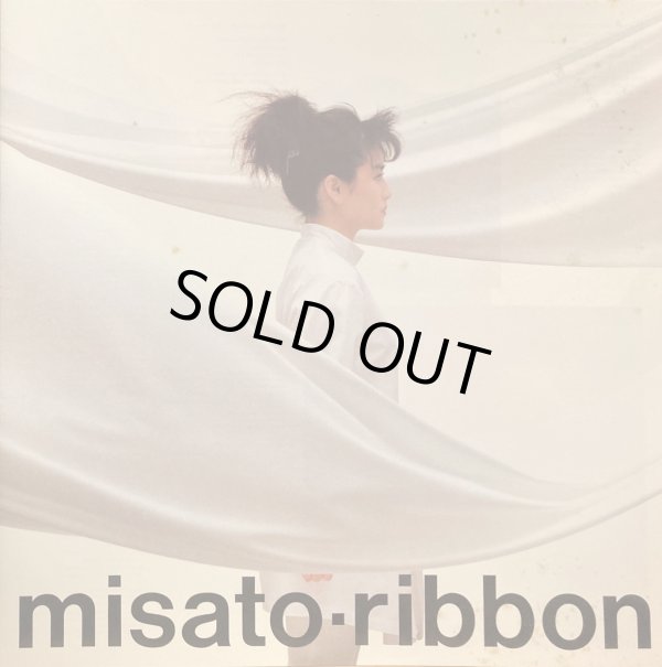 付属の歌詞＆ピンナップ・ブックレット